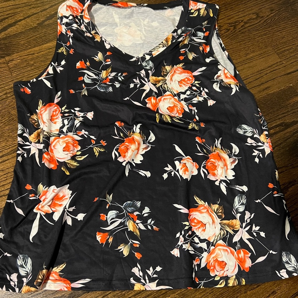 Never worn, black floral v-neck sleeveless top